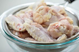 Chicken wings draining
