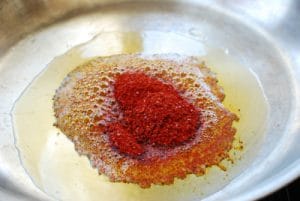 making chili oil in a pan